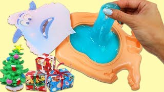 What's Inside Small Foot Migo's Slime Belly?! Searching for Surprise Toys!