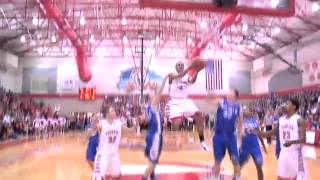 Indianapolis - Fishers High's Jaylon Brown penetrates and hangs in the air for the athletic lay-in