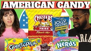 BRITISH PEOPLE TRY AMERICAN CANDY (TOOTSIE ROLLS, NERDS, JOLLY RANCHER, CHESTERS & GOBSTOPPER)