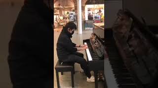 HK youth playing Glory to Hong Kong at St Pancras Intl. Station