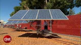Robots pivot solar panels to face the sun