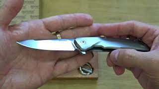 Мини обзор Нож LionSteel T R E  Titan Gray 01LS086