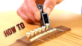 How to Remove Guitar Strings - Acoustic Guitar Maintenance