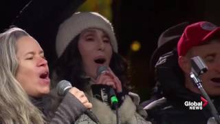 Celebrities come together to sing a song during anti-Trump rally