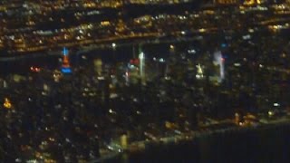 Flying Over New York City At Night - Manhattan Skyline After Dark