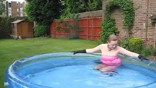 Wetlook girl -  Wetmar pink dress black boots
