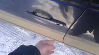 Видео: Как открыть дверь в Mitsubishi Outlander XL?