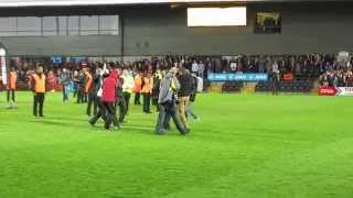 Tony Kleanthous comes onto the pitch