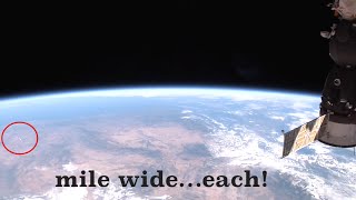 Huuuuuge "UFOs" appear in ISS live feed | MILE wide each!